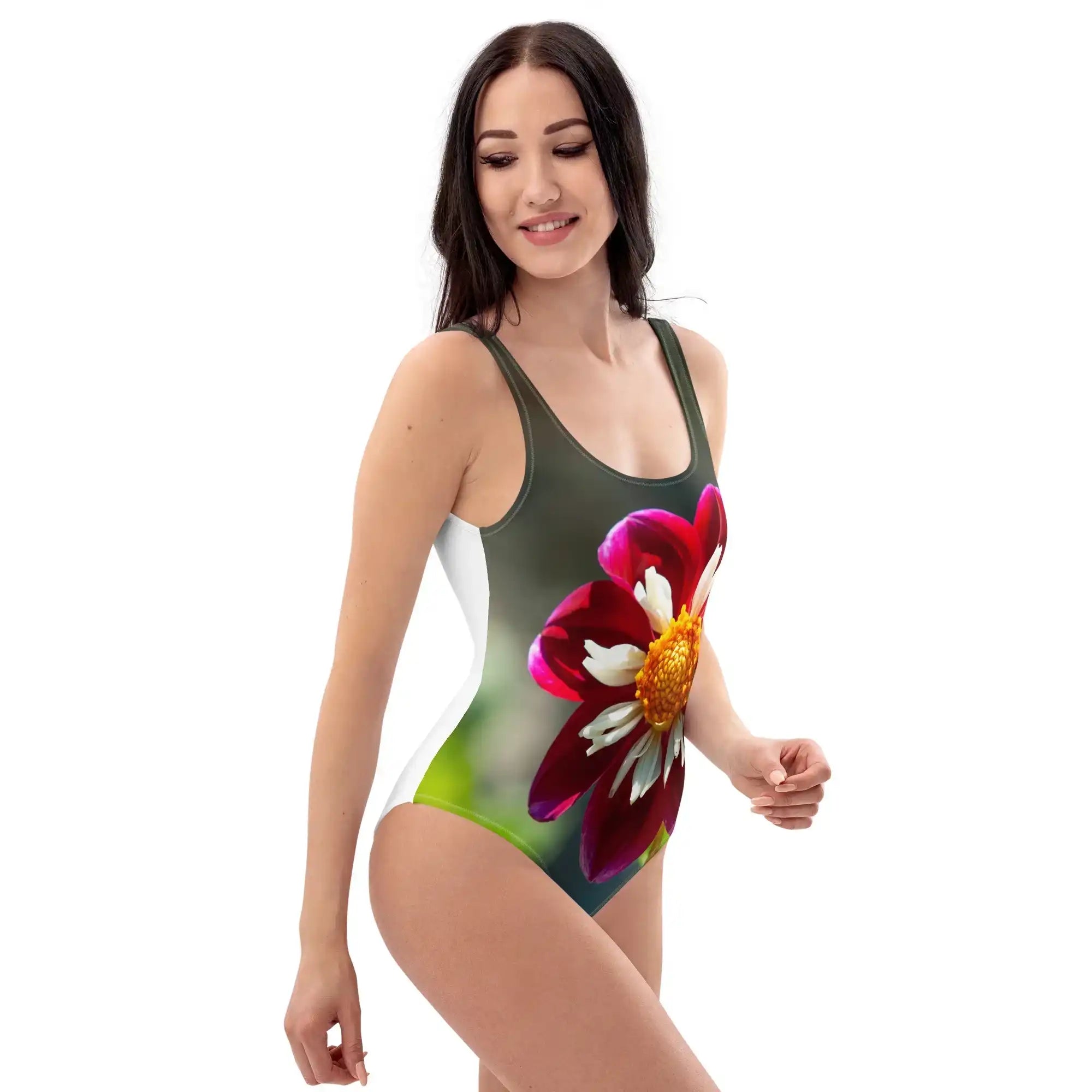 Woman wearing a swimsuit with a colorful flower design on a white background
