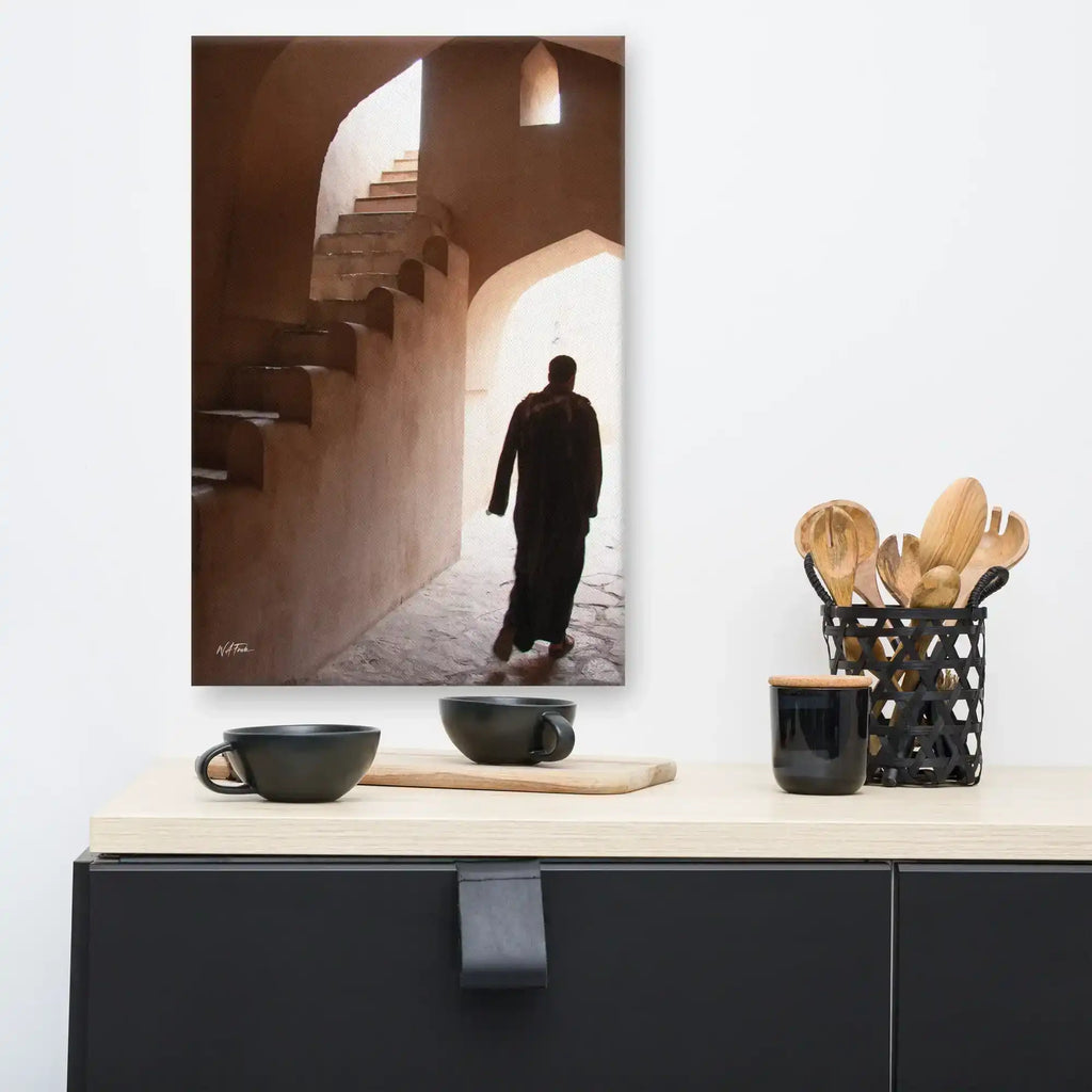 Canvas wall art featuring a person walking inside an arched, sunlit stone corridor with stairs, modern kitchen decor.