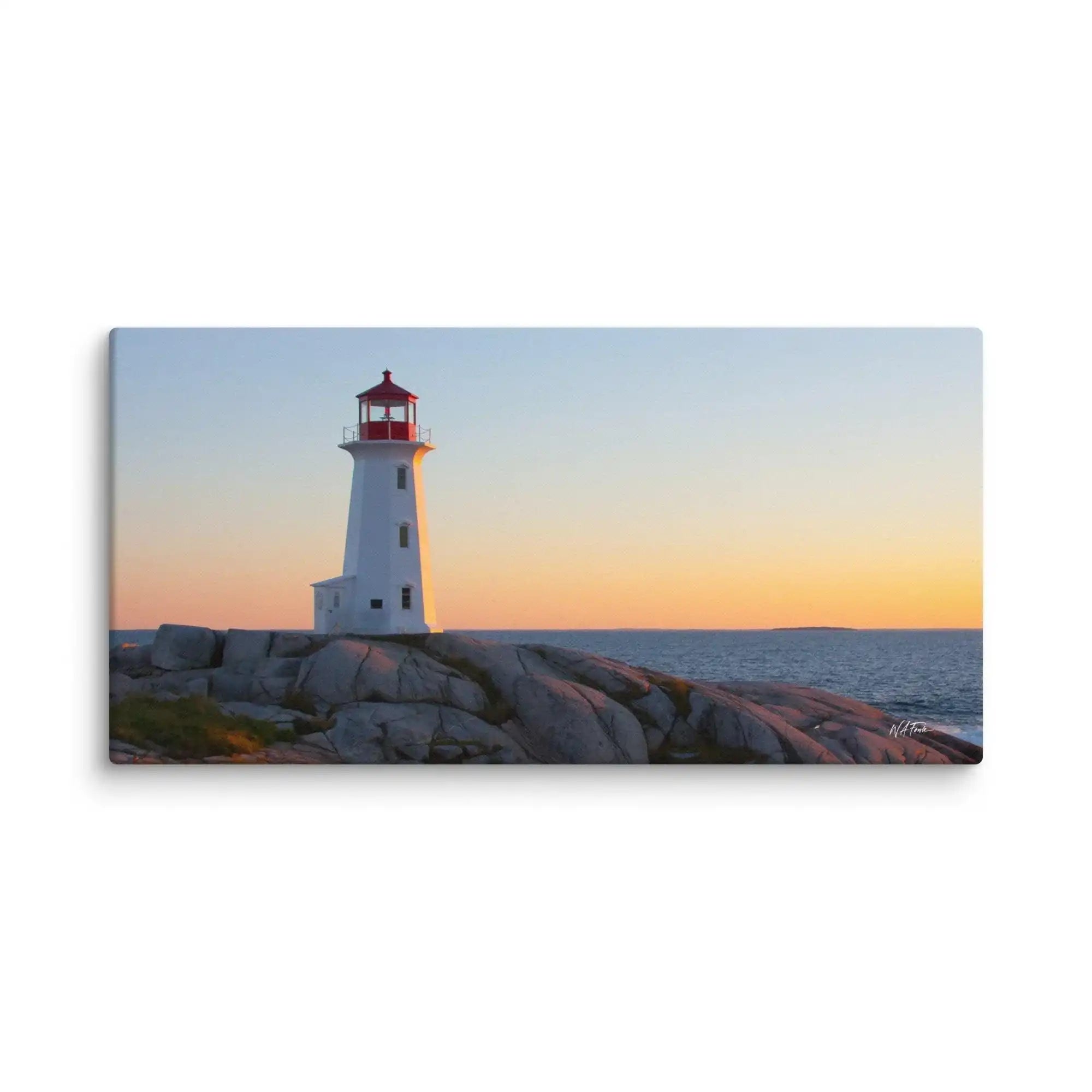 Canvas print of a white lighthouse on rocky coast at sunset, ocean view wall art