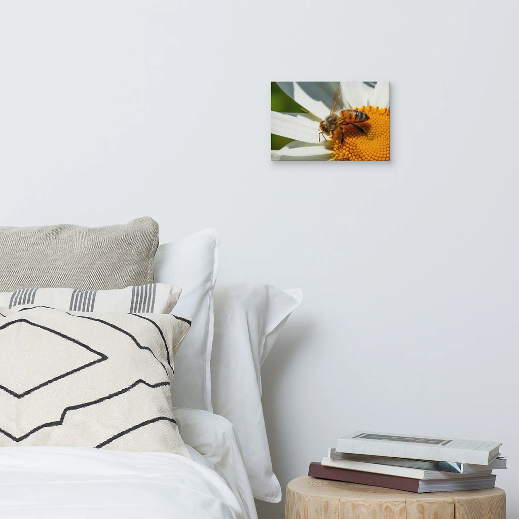 Bee on daisy flower canvas wall art in modern bedroom decor