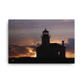 Scenic lighthouse in Bandon with vibrant sunset skies creating a perfect coastal view