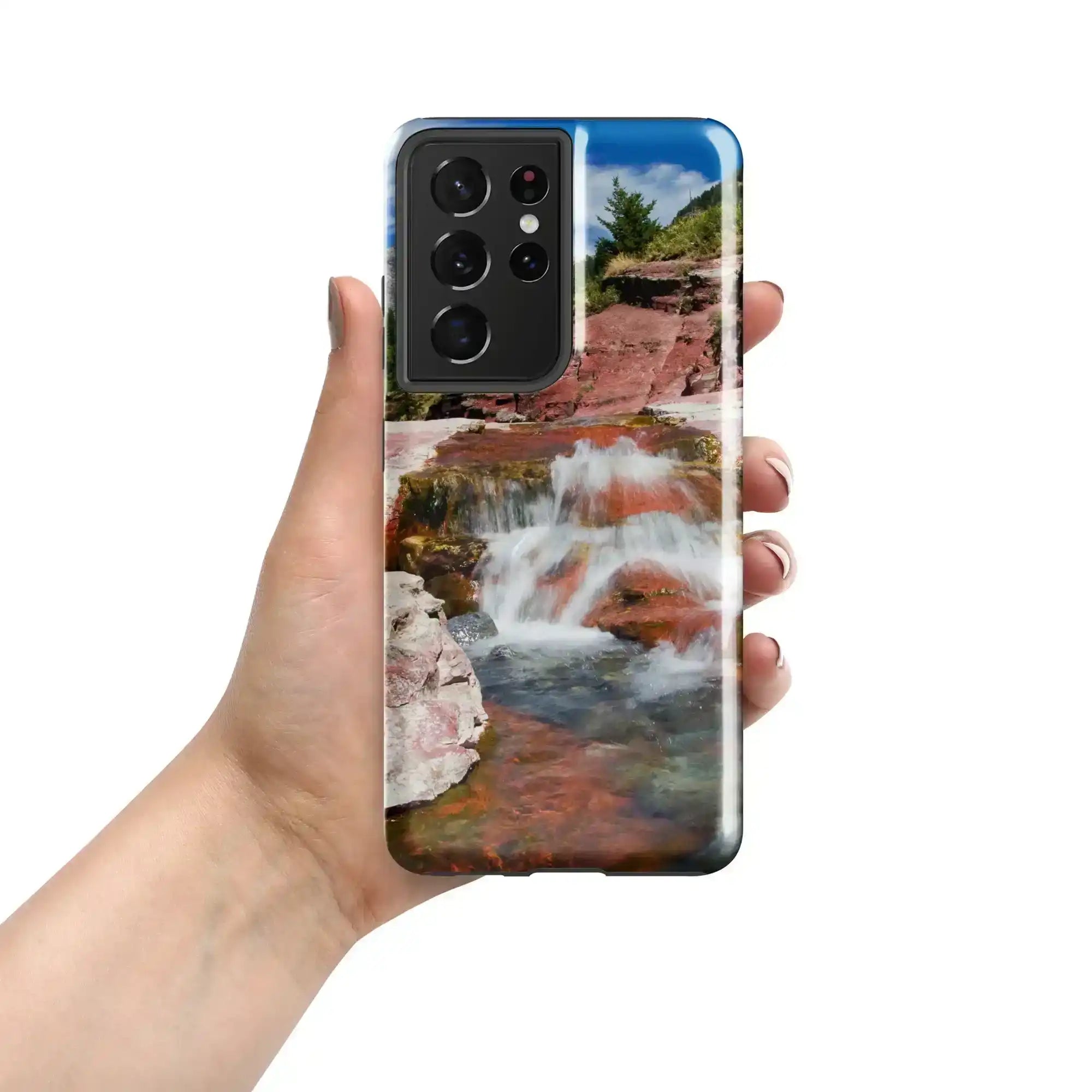 Glossy Samsung Galaxy S21 Ultra case with waterfall and red rock scenic photo held in hand