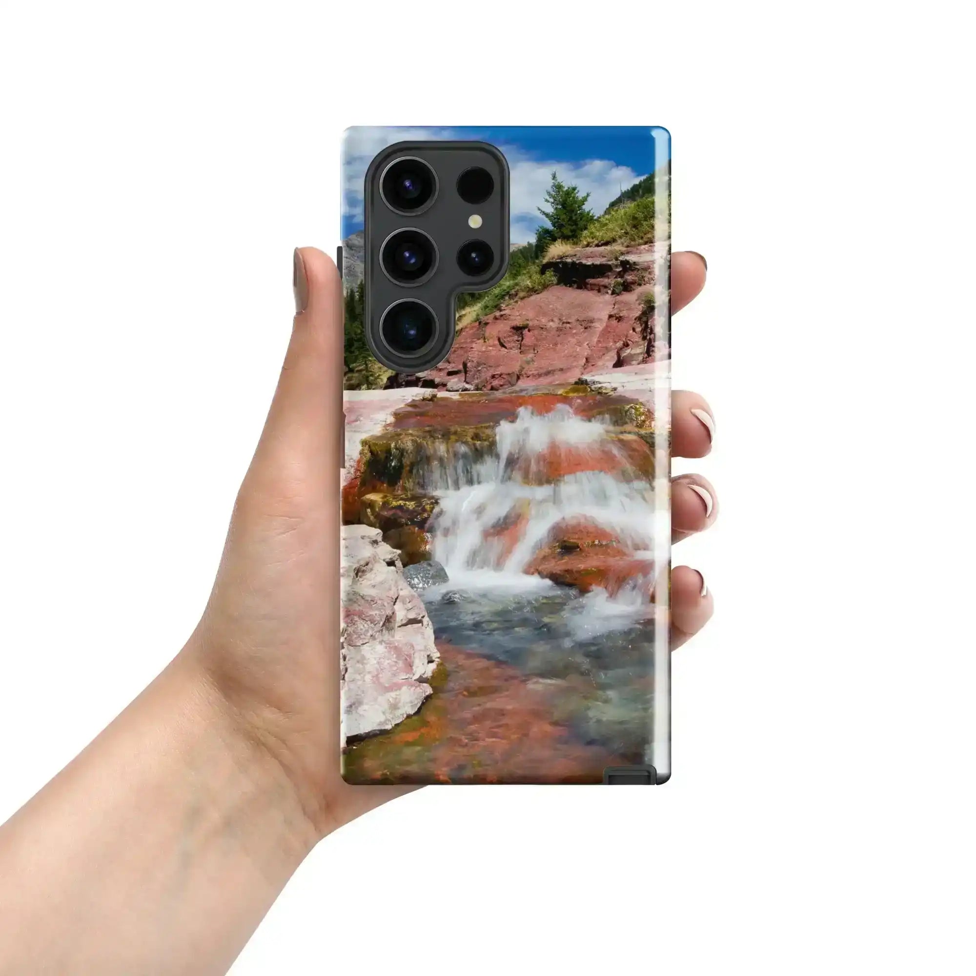 Hand holding Samsung Galaxy S23 Ultra case with colorful waterfall landscape photo print